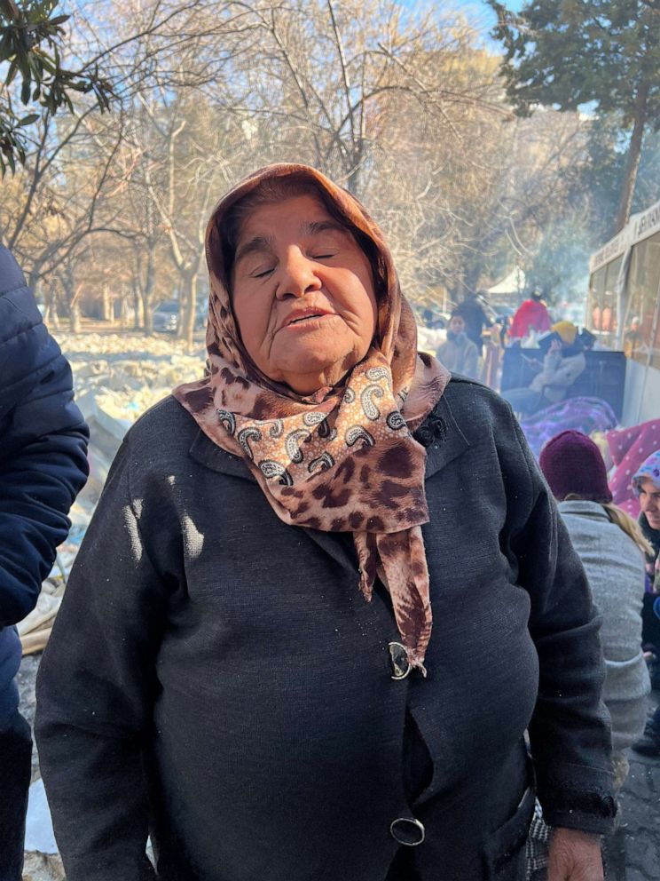 PHOTO: Gullu, 66, waits to hear news of her grandson, who has been trapped in the rubble of his building near Gaziantep, Turkey.