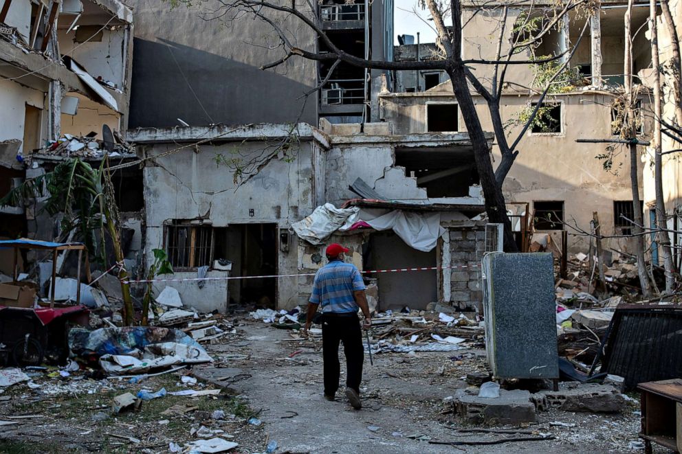 PHOTO: A man looks at the remains of his home in the neighborhood of Karantina, Beirut, Aug. 12, 2020.