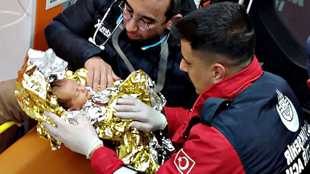 PHOTO: Ten-day-old baby Yagiz Ulas is examined by first responders in Hatay, Turkey on Feb. 9, 2023, after being rescued from the rubble 90 hours after 7.7 and 7.6 magnitude earthquakes hit parts of Turkey and Syria. The child's mother was also rescued.