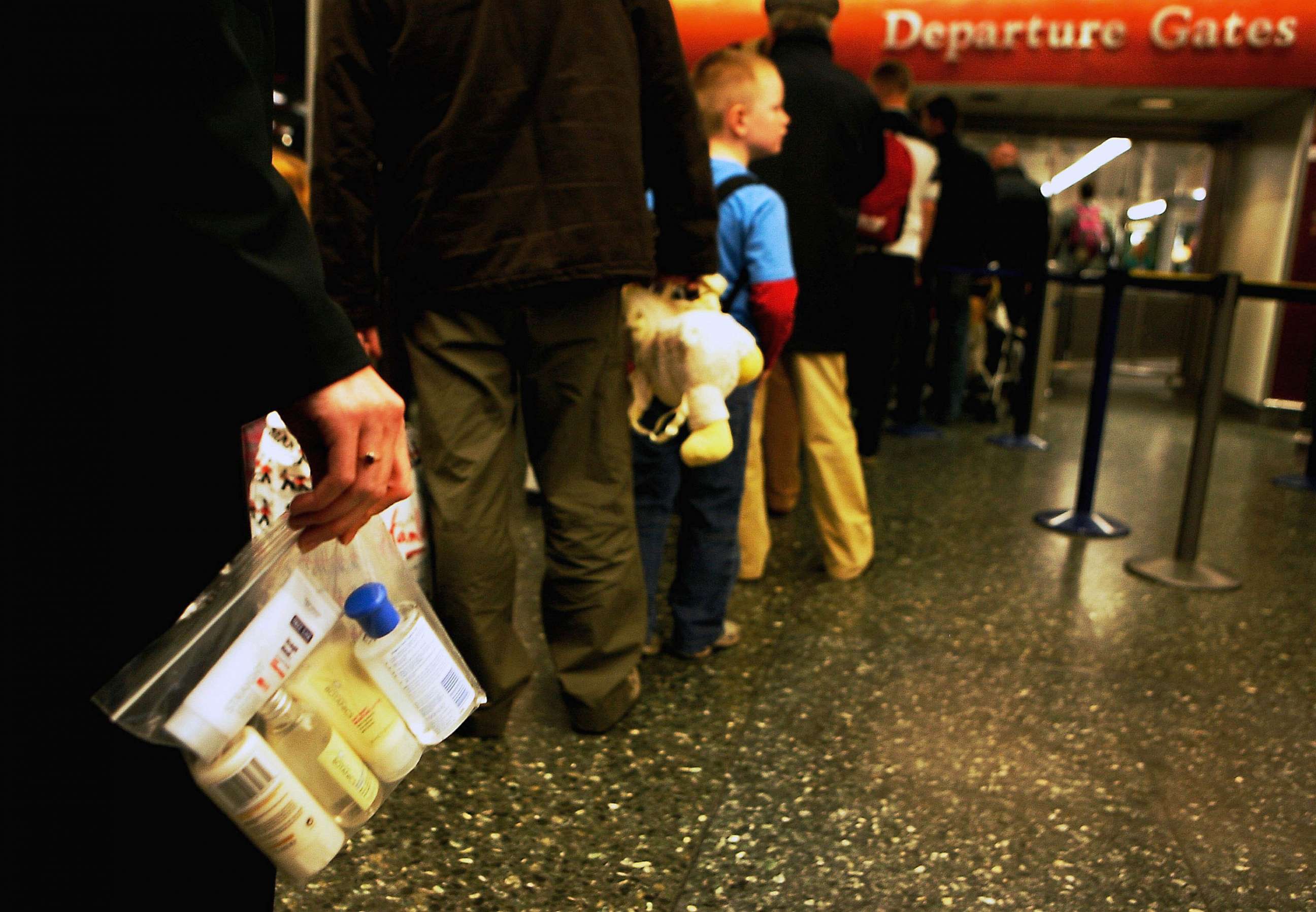 PHOTO: FILE - In this photo illustration a BAA employee holds a plastic bag with liquid containers consistent with new British airport security requirements for carrying liquids through security at Gatwick Airport, Nov. 6, 2006 in London.