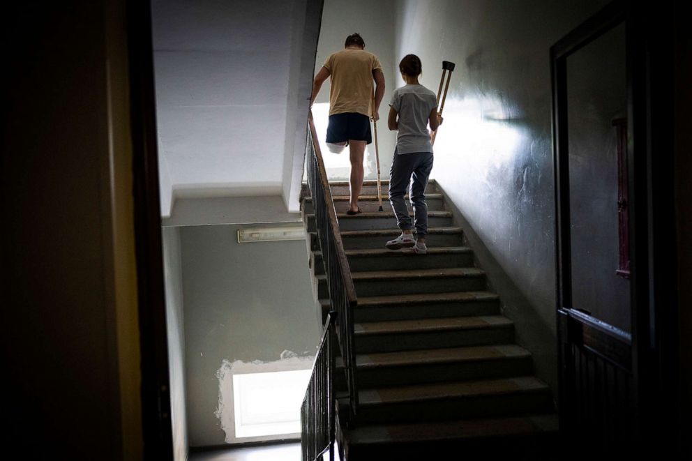 PHOTO: Sasha Horokhivskyi makes stair-climbing exercises at a hospital in Kyiv, Ukraine, May 4, 2022. Sasha lost his leg above the knee on March 22 after being shot by a territorial defense member who mistook him for a spy near his home.