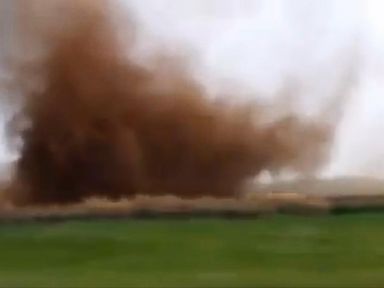 VIDEO: A whirling tornado-like vortex formed in a field off a highway near Brisbane, in eastern Australia.