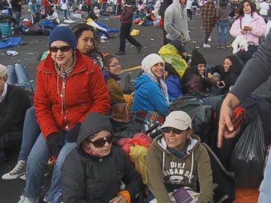 VIDEO: An estimated 1 million pilgrims gathered in Quito's Bicentennial Park, many sleeping overnight in pouring rain, to hear Pope Francis give mass during his trip to Latin America.