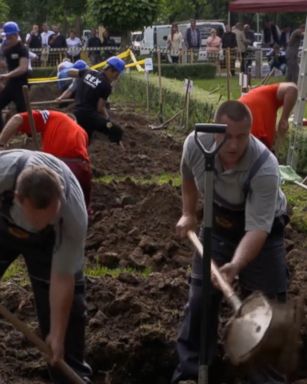 VIDEO: Two-man teams wielded shovels in a contest meant to attract people to the job of grave digging.