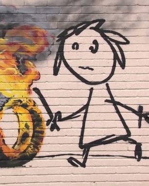 VIDEO: The street artist left his mark on a school in Bristol, England.