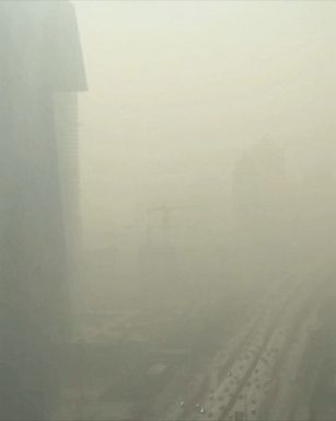 Chas Pope, a British engineering consultant working in Beijing, shot a time lapse video taken over just 20 minutes showing smog rolling into Beijing. 