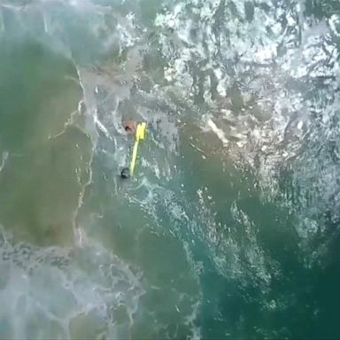 VIDEO: A drone for the first time has been deployed to rescue swimmers that got into trouble off an Australian beach.