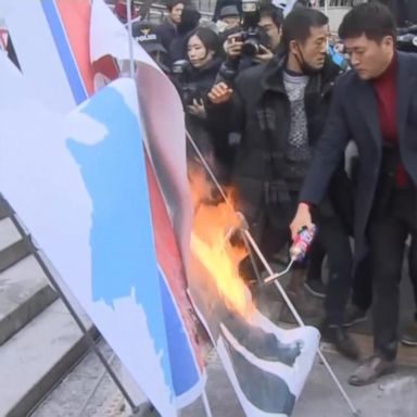 VIDEO: Protests show mixed response in South Korea to plan for Olympians from the North and South to march together and field a joint hockey team.