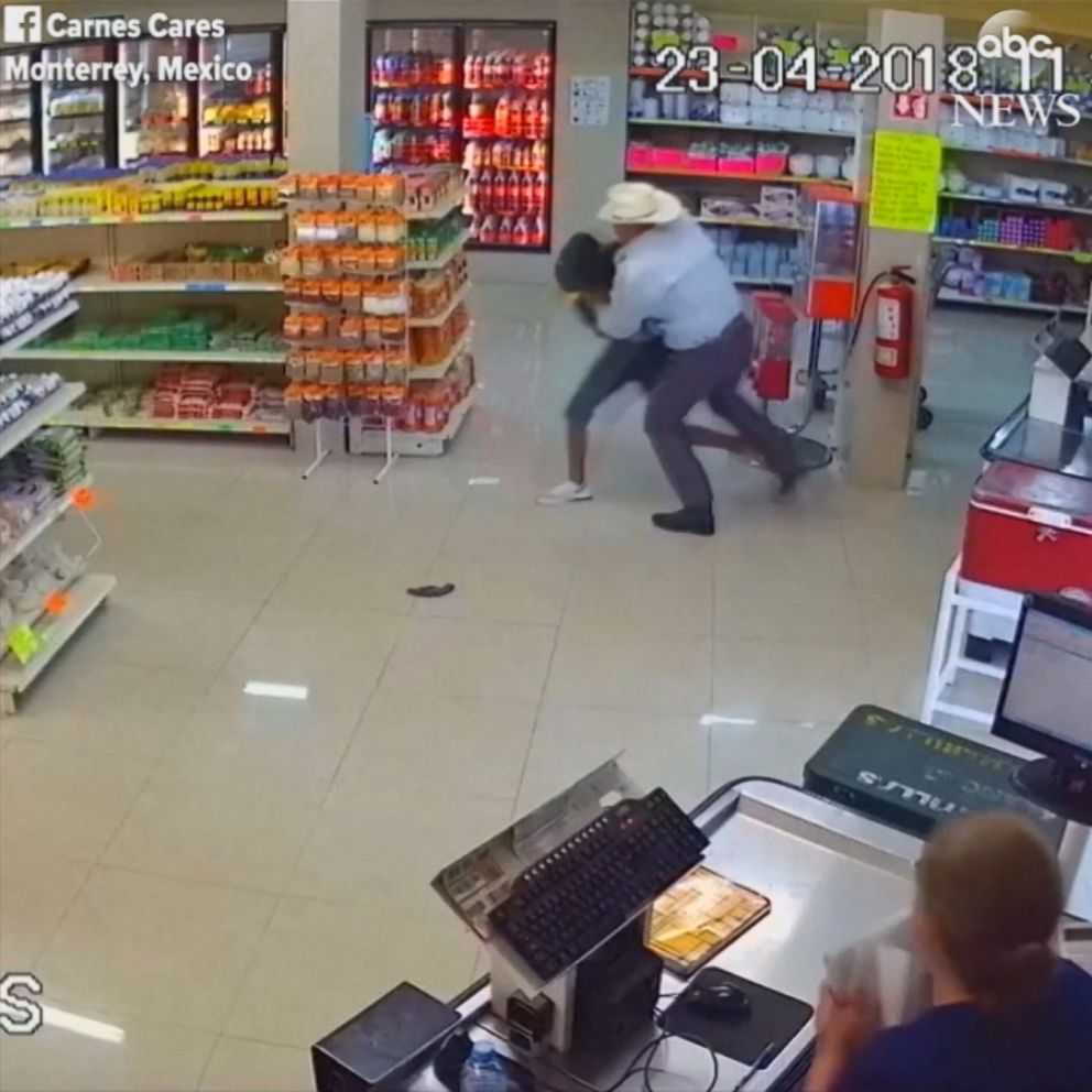 Video Cowboy-hat wearing man tackles would-be robber - ABC News