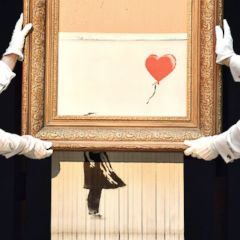 Banksy auction, Trump meets Kanye, polar bear in Germany: World in Photos