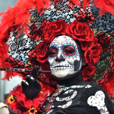 VIDEO: Catrinas Parade, running of the clowns, field of fireweed: World in Photos, Oct. 22