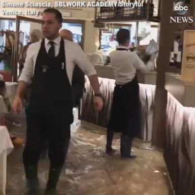 VIDEO: Venice pizzeria dishes out slices despite flooding