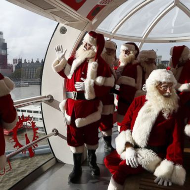 VIDEO: Santas ride the London Eye, voters cast ballots: World in Photos, Nov. 9