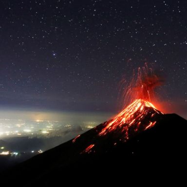 VIDEO: A volcanic eruption, a Bollywood wedding, a tree lighting: World in Photos, Nov. 29 