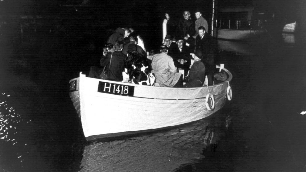 This 1943 photo shows a boat carrying people during the escape across the Oresound of some of 7,000 Danish Jews who fled to safety in neighboring Sweden three years after the German Nazi invasion.