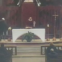 Priest stabbed during live-streamed church service before stunned parishioners