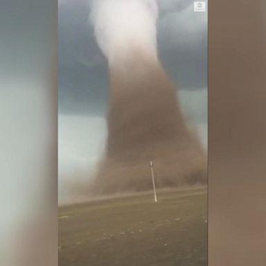 VIDEO: Onlookers awed by spectacular tornado as it twists through countryside