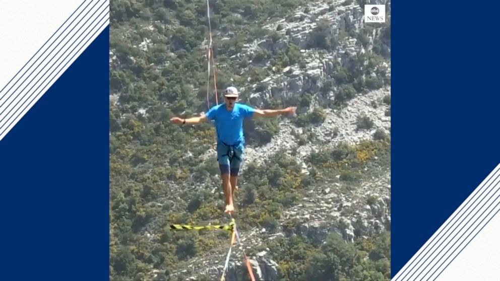 Adventure-seekers traverse 800-meter-long slackline perched 300 meters high in the French Alps for a dose of adrenaline.
