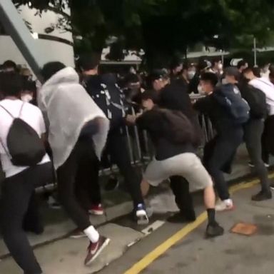 VIDEO: Protesters set up barricades in heart of Hong Kong