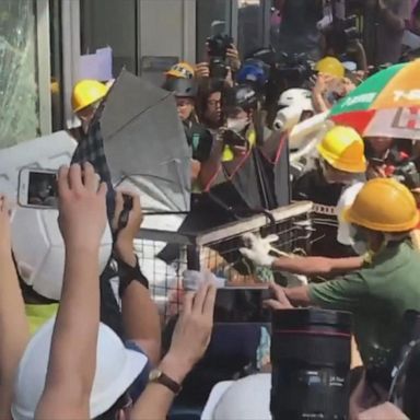 VIDEO: Protesters try to batter their way into Hong Kong legislative building