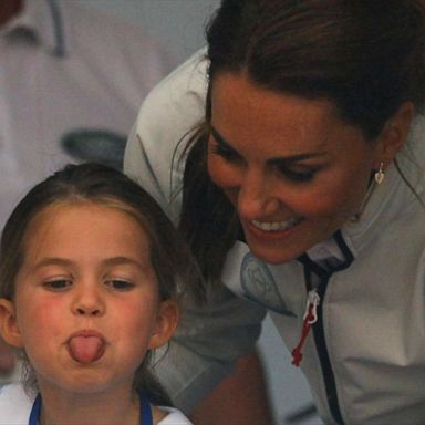 PHOTO: The daughter of Prince William and Duchess Kate stuck her tongue out after being encouraged to wave to the crowd.