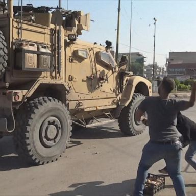 VIDEO: Kurds hurl potatoes at withdrawing US forces