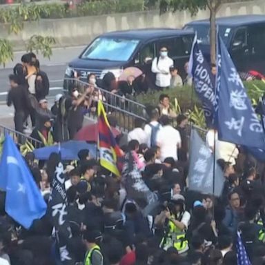 VIDEO: Across the Pond: Hong Kong protesters clash with police at rally for Uighurs