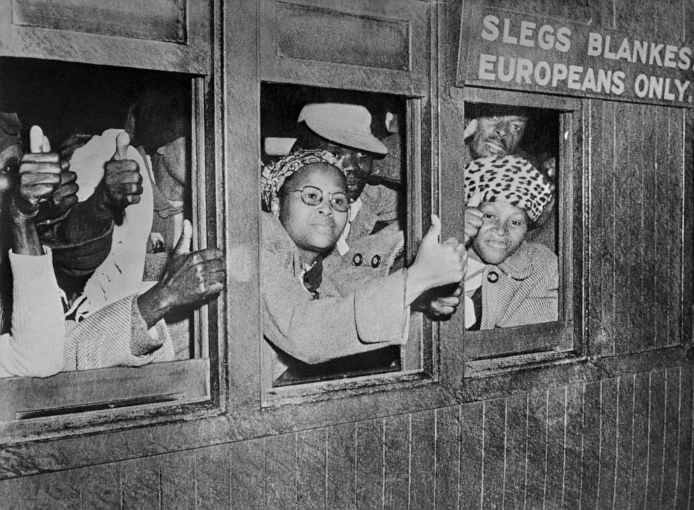 PHOTO: Protesters take part in the civil disobedience campaign, in June 1952, in Johannesburg, by occupying places for white people.