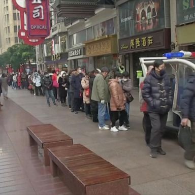 VIDEO: Hundreds stand in line for protective face masks in Shanghai