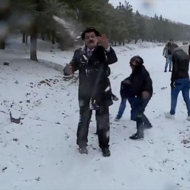 VIDEO: TV weatherman bombarded with snowballs during report