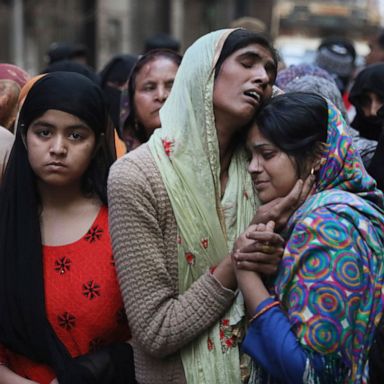 VIDEO: Violence in India, floods in UK, comforting a koala: World in Photos Feb. 27