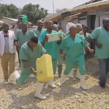 Doctor, nurses, and friends celebrated after the Democratic Republic of the Congo discharged its last Ebola patient from a treatment center.