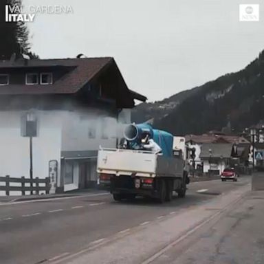 Firefighters and sanitation workers came up with a new solution to fight the spread of coronavirus, using snow cannons from the ski slopes to spray disinfectant around the local villages.