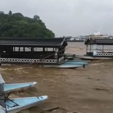 Towns in southwestern Japan have been overtaken by widespread flooding.