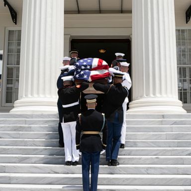 VIDEO: John Lewis laid to rest, Portland protests, Hurricane Hanna; World in Photos, July 27