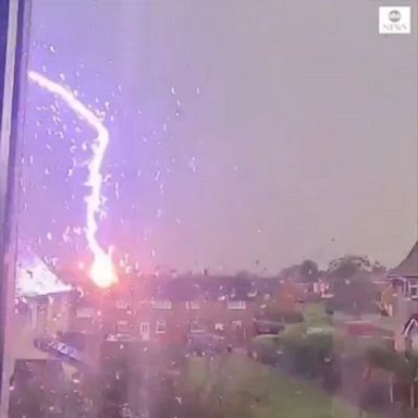 A resident in northern Wales filmed the moment lightning struck a transformer. 