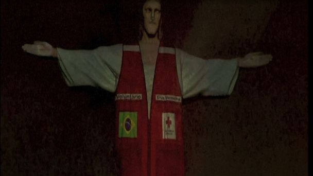 Video Red Cross Uniform Projected Onto Rio De Janeiro S Christ The Redeemer Abc News