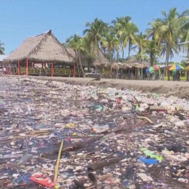 Trash washes ashore Honduras beach