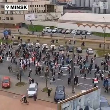 An estimated 100,000 protesters marched peacefully through Minsk, demanding that President Alexander Lukashenko resign or face a national strike.