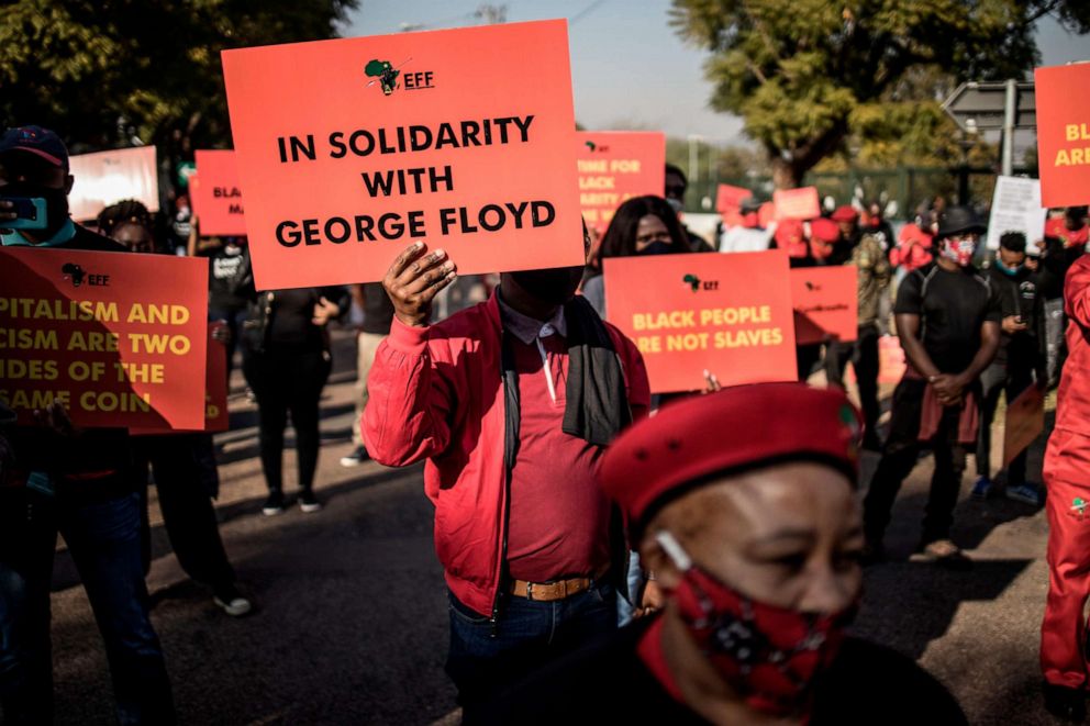 PHOTO: South Africa's Economic Freedom Fighters supporters gather in front of the United States Embassy in Pretoria, on June 8, 2020, in solidarity with the global Black Lives Matter movement.