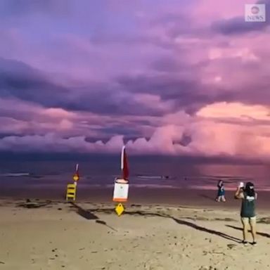 Lightning flashed through storm clouds during sunset in Australia.