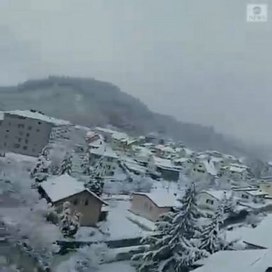 A mix of rain and snow blanketed roads, buildings and trees in Trimbach.