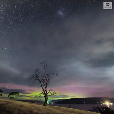 A Tasmania photographer captured a stunning time-lapse video of aurora australis illuminating the night sky.