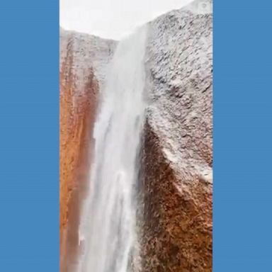 Waterfalls streamed from the typically dry landmark in Australia’s Northern Territory because of torrential rains.