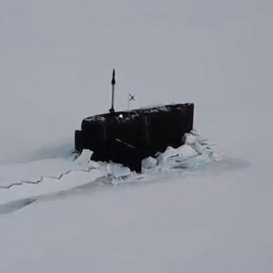 Three Russian military submarines broke through the ice simultaneously in the Arctic, in video released by Russia’s defense ministry.