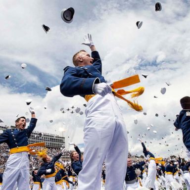 VIDEO: Commencement hat toss, California drought, spiral galaxy: World in Photos, May 27