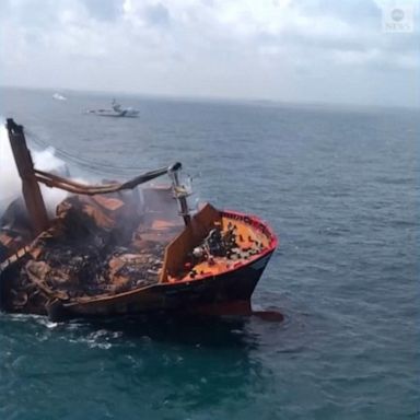 PHOTO: A cargo ship carrying 1,486 containers of harmful chemicals starts to sink after catching fire in what authorities are calling one of Sri Lanka's worst ever marine disasters.