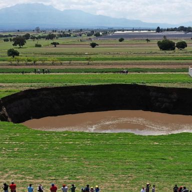 VIDEO: A giant sinkhole, a toxic ship burning, the French Open: World in Photos, June 2