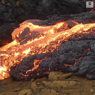 PHOTO: Lava glowed from inside an egg-shaped lobe at a volcano on the Reykjanes peninsula in Iceland, in incredible footage from the scene at a volcano in Geldingadalir.