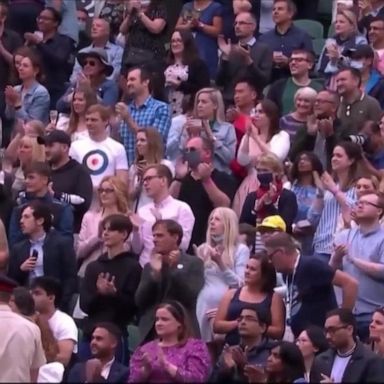 Developers of the AstraZeneca coronavirus vaccines were given a standing ovation by the crowd before play began at Wimbledon.